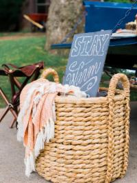 Baskets nearby fire pit makes it cozy