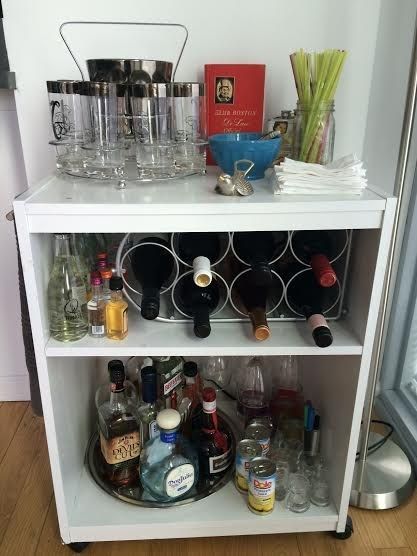 A bookcase is less expensive than a bar cart.