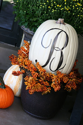 pumpkin with a monogrammed letter on outside.